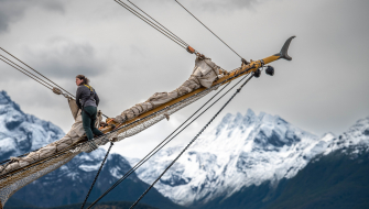Deckhands at the bowsprit