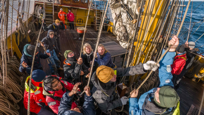 Our voyage crew is pulling the ropes