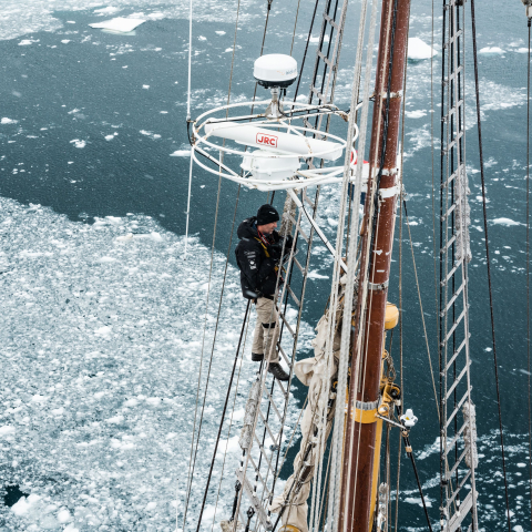 Climbing mast in Antarctica - Bark Europa Benjamin Hardman
