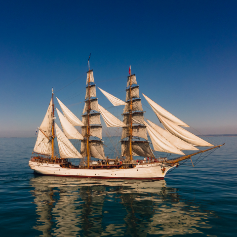 Under full sails